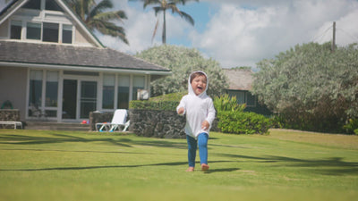 Little Boy Playing in His Baby Bamboo Sun Legz™