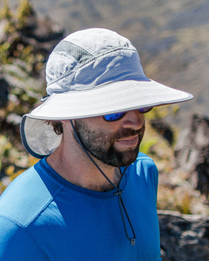 Men wearing the ultra adventure hat in pumice|pumice